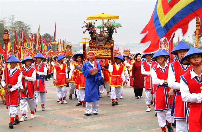  Ceremonial: A long-standing tradition is maintained, with soldiers in traditional attire accompanying the palanquin. — VNS Photo Nguyễn Trung Kiên Read more at http://vietnamnews.vn/life-style/374094/hung-kings-day-honouring-founding-fathers.html#wg5tLQ7CWsS5itqP.99