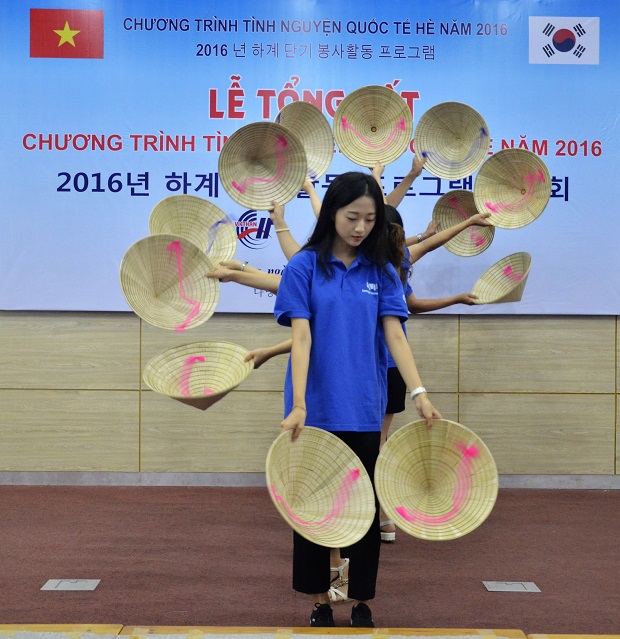  ….performing a conical hat dance at the Viet Nam-South Korea Friendship IT Junior College last year