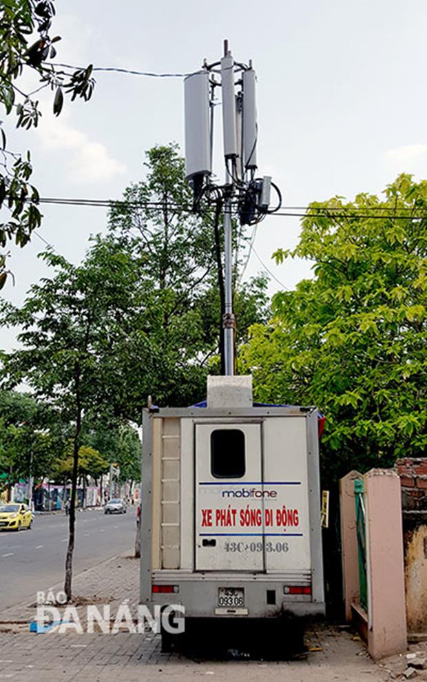 A mobile station of Mobifone Network Operator is available on a local street to ensure the smooth internet connection during the festival