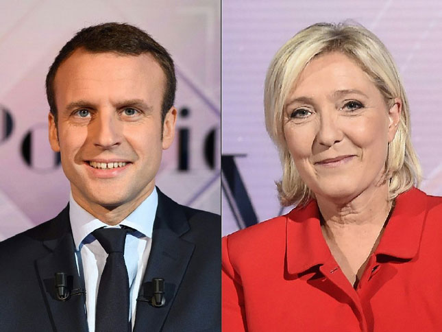 Hai ứng viên Emmanuel Macron và Marine Le Pen có quan điểm trái ngược nhau về vấn đề châu Âu, nhập cư... 							Ảnh: AFP