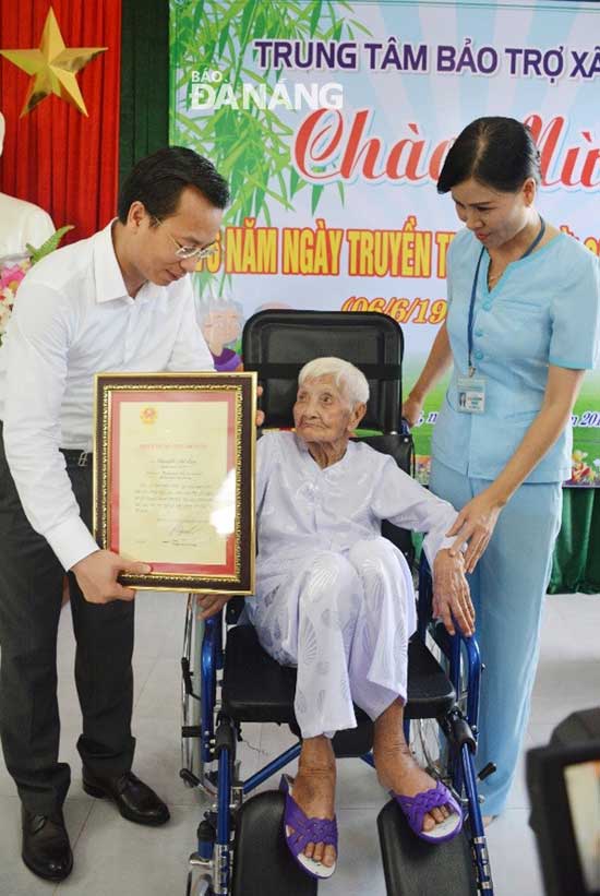 .. and a 100th Birthday Longevity Certificate to Mrs Nguyen Thi Lan.