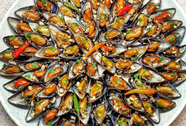 Instead of grilling these oysters western style with tomatoes or butter, Amber makes them the Vietnamese way with fish sauce and scallion oil