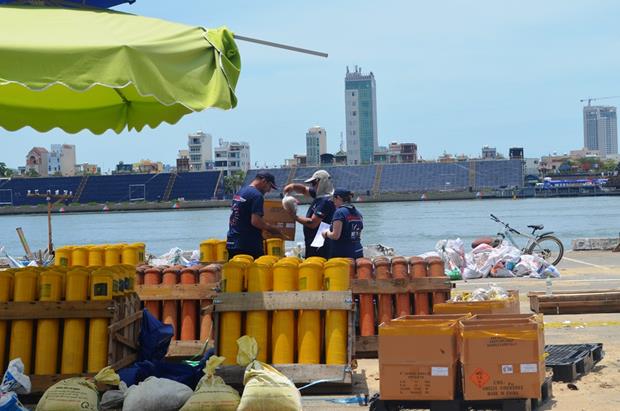 Italian team members preparing their fireworks in the extremely hot weather