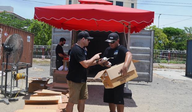  Despite the hot weather, fireworks team members are focusing hard on preparing their fireworks