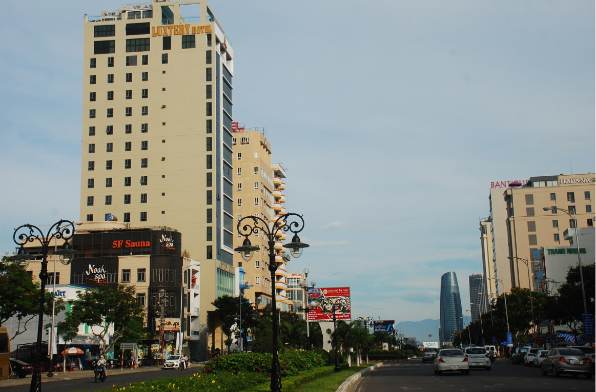 Many advertising boards in foreign languages on a local street