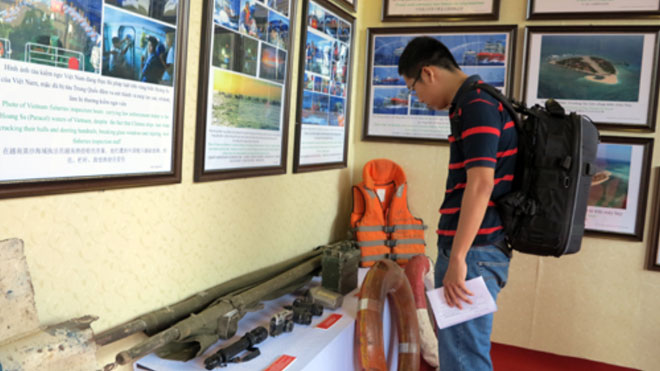 A local visitor seeing the artifacts on display at the event 