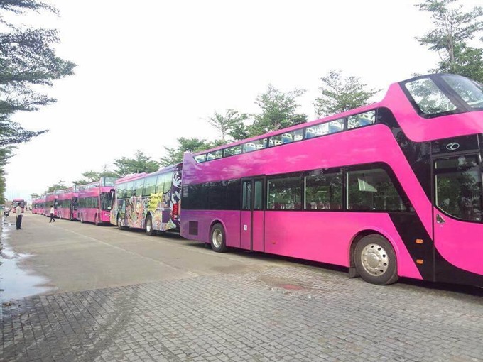 New fleet: The first batch of 12 open-top double-decker buses that will offer sight-seeing tours in Đà Nẵng City. Photo courtesy CocoBay Read more at http://vietnamnews.vn/life-style/379900/open-double-decker-bus-debuts-in-da-nang.html#GiWiWeRz3DKVesIm.99