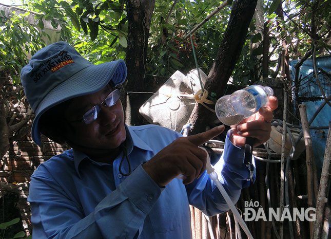  A discarded plastic bottle can provide an ideal place for mosquitoes to lay their eggs.