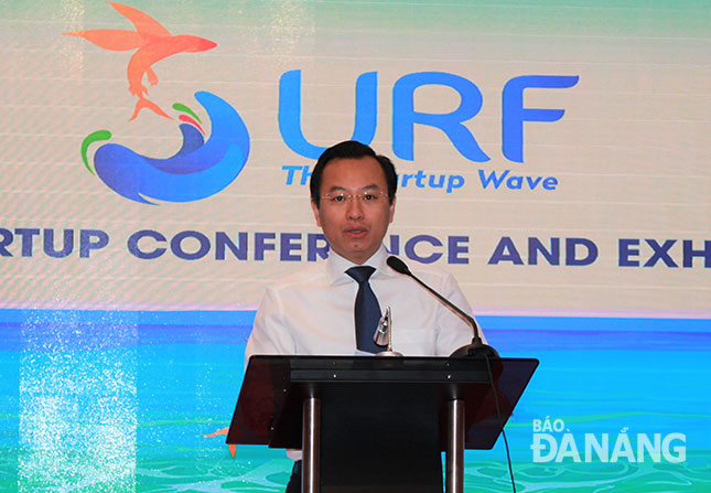 Bí thư Thành ủy, Chủ tịch HĐND thành phố Nguyễn Xuân Anh phát biểu tại lễ khai mạc Hội nghị và triển lãm khởi nghiệp Đà Nẵng SURF 2017.  		       Ảnh: KHANG NINH 