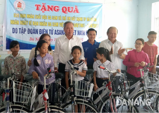 Some AO victims receiving bicycles 