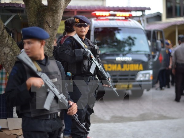 ndonesian police guard at terrorist attack scene in Medan, North Sumatra on June 25 (Source: VNA)