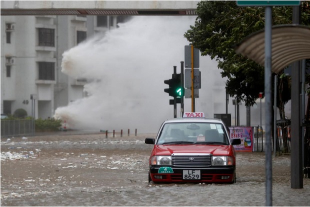 Waves triggered by Typhoon Hato are seen in Hong Kong, China August 23, 2017.