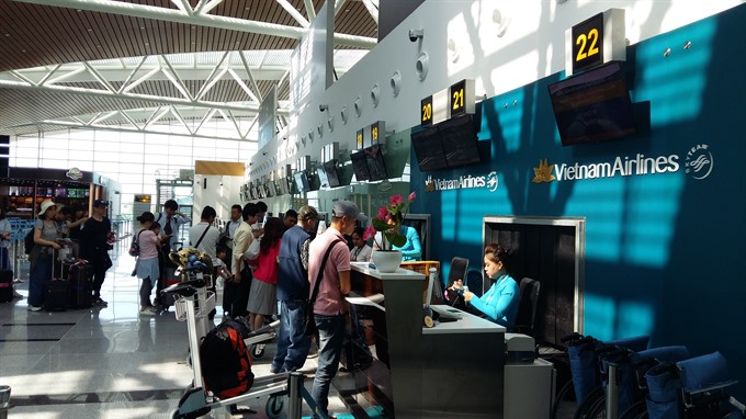 Passengers check in at the new terminal of Đà Nẵng International Airport. Read more at http://vietnamnews.vn/society/392481/public-security-camera-system-set-for-apec.html#2zT41hw2eLDRUj15.99