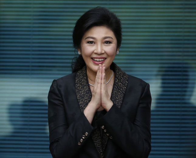 Bà Yingluck Shinawatra được cho đã rời Thái Lan từ ngày 23-8 và đang tìm cách xin tị nạn ở Anh.				          Ảnh: AP