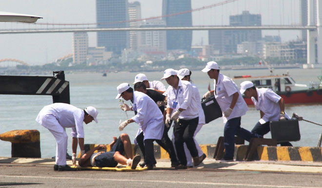 Local doctors giving first-aid to some victims