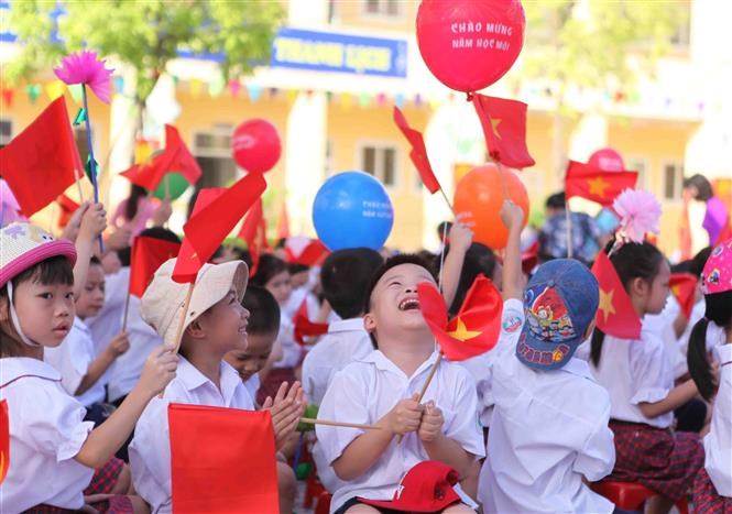 Pupils of the Vinh Hung School show their enjoyment