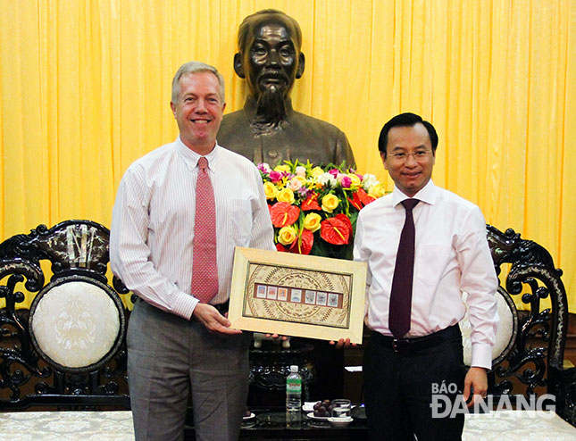 US Ambassador Ted Osius (left) and Secretary Anh