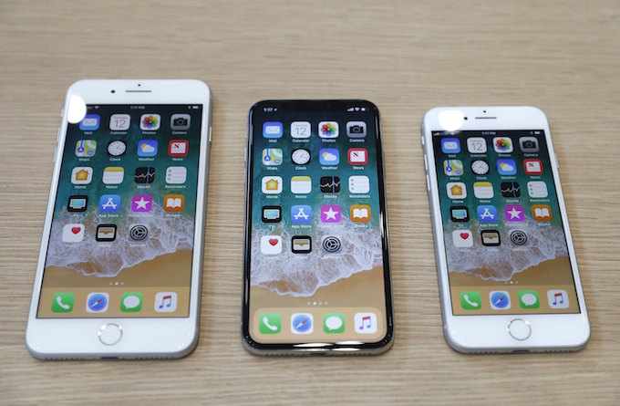 (L-R) iPhone 8 Plus, iPhone X and iPhone 8 models are displayed during an Apple launch event in Cupertino, California, U.S. September 12, 2017. Photo by Reuters/Stephen Lam