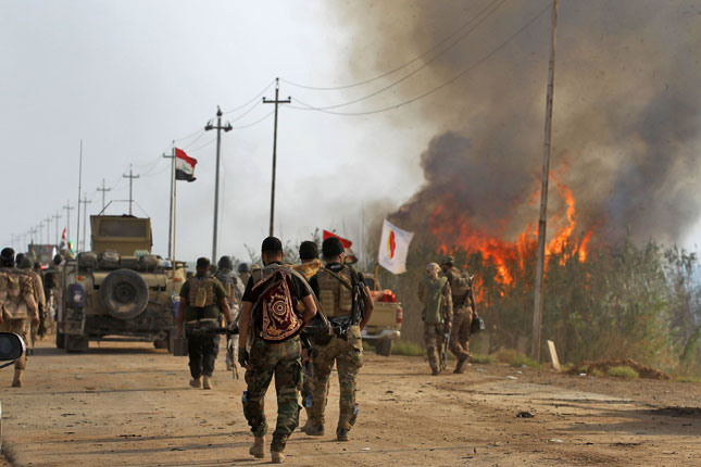 Lực lượng Iraq và các chiến binh Shiite chiếm thị trấn Hawija từ tay IS.       Ảnh: Getty Images