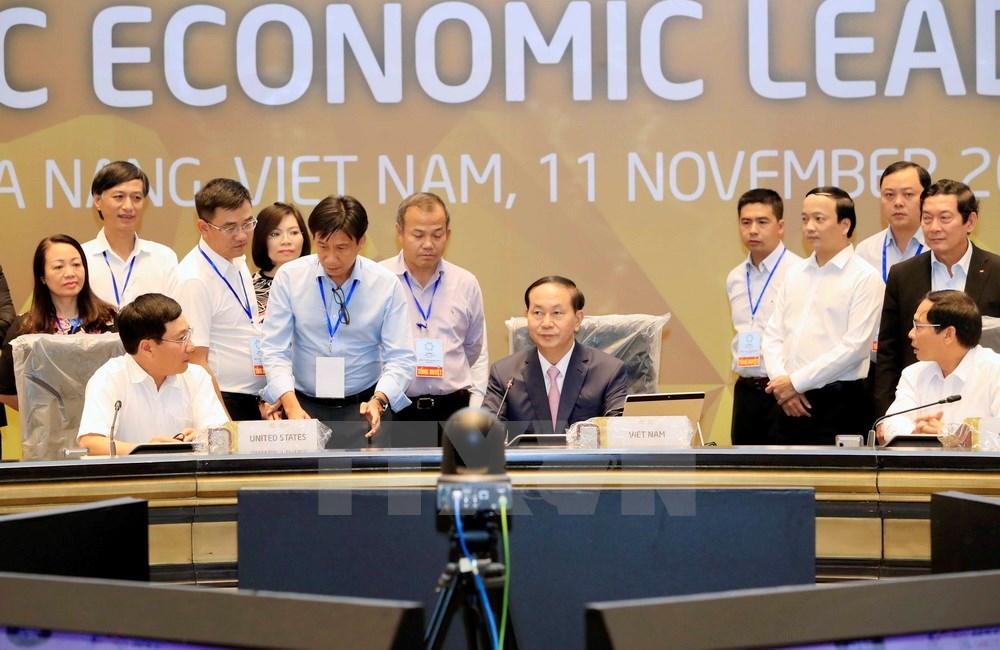 President Tran Dai Quang sits at a meeting room of the Week (Photo: VNA)