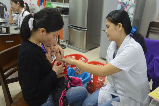 A child being vaccinated at the Centre