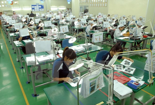 Dây chuyền sản xuất linh phụ kiện điện tử tại Công ty TNHH Flexcom Việt Nam, vốn đầu tư của Hàn Quốc, tại Khu công nghiệp Yên Phong (Bắc Ninh). (Ảnh: Danh Lam/TTXVN)