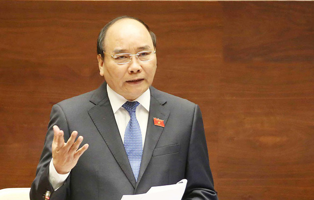 Thủ tướng Nguyễn Xuân Phúc trả lời chất vấn tại kỳ họp cuối năm ngoái.