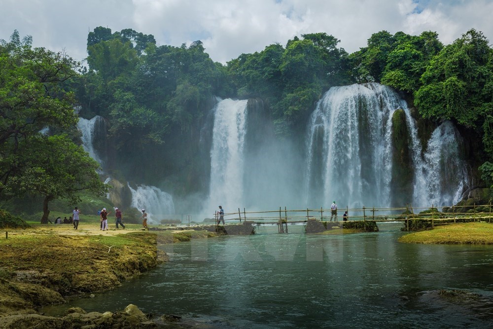 Laying at the foot of the waterfall is a river (Photo: VNA)