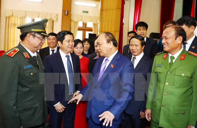 Thủ tướng Nguyễn Xuân Phúc với các đại biểu tại hội nghị tiếp xúc cử tri, sáng 4/12, ở Hải Phòng. (Ảnh: Thống Nhất/TTXVN)