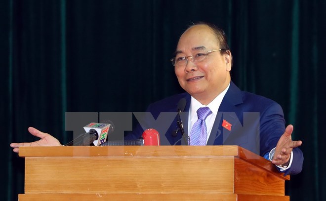 Thủ tướng Nguyễn Xuân Phúc phát biểu tại hội nghị tiếp xúc cử tri, sáng 4/12, ở Hải Phòng. (Ảnh: Thống Nhất/TTXVN)