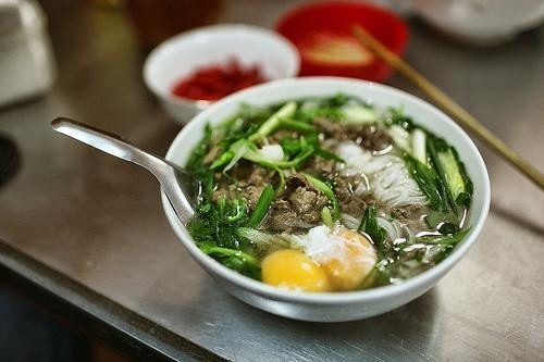 Classic: Phở bò (beef noodle), the original dish served with two poached eggs. — VNS File photos Read more at http://vietnamnews.vn/life-style/419209/more-than-a-bowl-of-noodles-pho-is-history.html#q65zfGKsHVuz84Q7.99