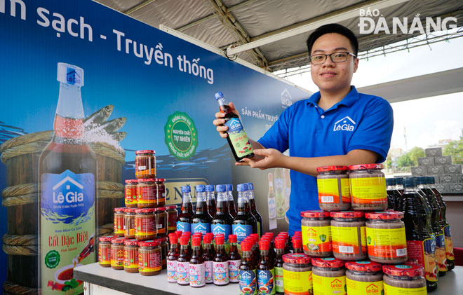 A stand showcasing ‘nuoc nam’ (traditional Vietnamese fish sauce) products