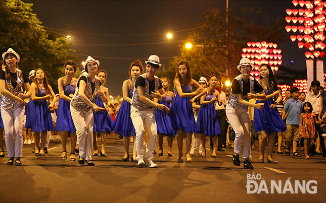 A street parade of live music and dancing along a section of Tran Hung Dao