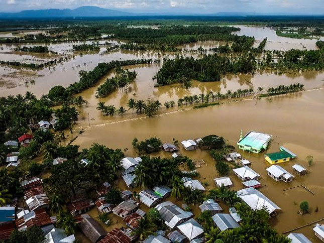 Thành phố Kabacan thuộc tỉnh Bắc Cotabato trên đảo Mindanao chìm trong biển nước.	               Ảnh: AFP