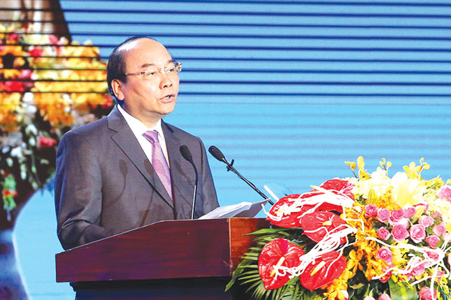 2 Prime Minister Nguyen Xuan Phuc addressing the grand ceremony (Photo: Van No)