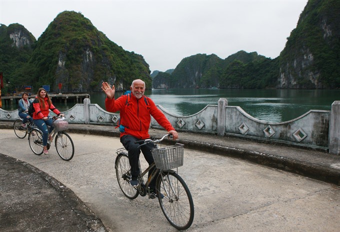 6. Visitors ride bicycles on Cát Bà Island in the northern province of Hải Phòng. Việt Nam received a record 12.9 million foreign visitors in 2017. — VNA/VNS Lâm Khánh Read more at http://vietnamnews.vn/life-style/420323/top-ten-cultural-and-tourism-events-of-2017.html#Pu7qXphdYhcllQCE.99