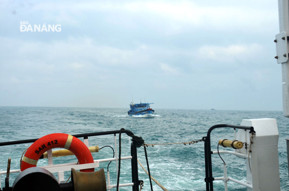 Rescue ship SAR 274 towing the fishing boat back to the mainland