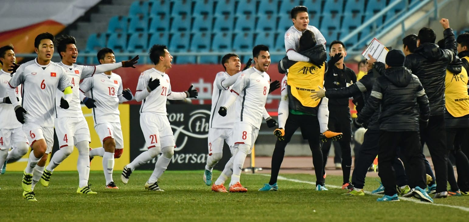 The Vietnamese squad celebrating their unbelievable victory over Qatar (Photo: AFC)