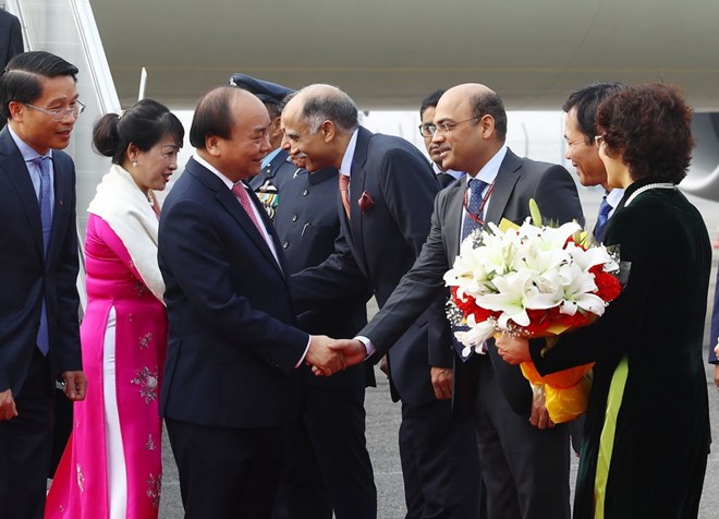 Lễ đón Thủ tướng Nguyễn Xuân Phúc và Phu nhân tại sân bay quân sự Palam, New Delhi trưa 24/1. (Ảnh: Thống Nhất/TTXVN)