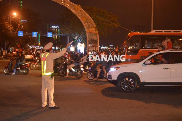 A local police officer regulating traffic 