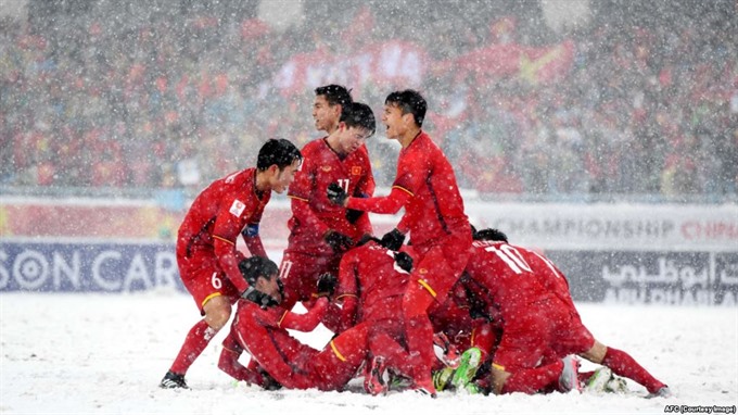 Vietnamese players celebrate their goal during the final of the AFC U23 Championship in China on Saturday. — Photo the-afc.com Read more at http://vietnamnews.vn/sports/422030/u23-squad-honoured-after-asian-championship-success.html#Lke2C221s4qifF2b.99