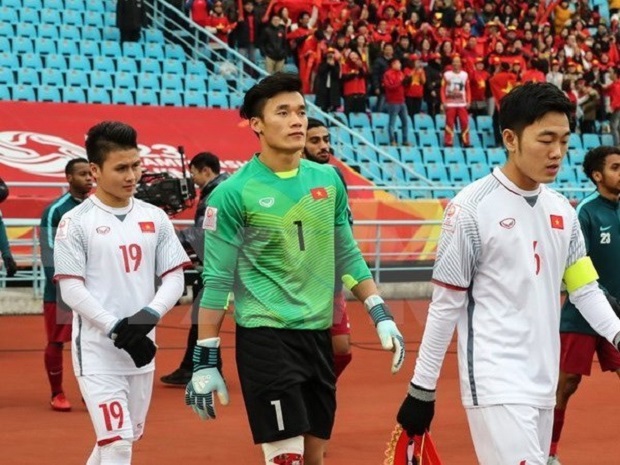 Goalkeeper Bui Tien Dung (C) and right wing Nguyen Quang Hai (L) has been picked as two of the best players after the three-week Asian Football Confederation (AFC) U23 Championship (Source: VNA)