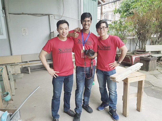 Teamwork: John Masud Parvez (centre) stands with other members of the Vietnam Social Health Revolution. The organisation aims to develop a healthier Việt Nam. — Photo from Facebook of John Smith Read more at http://vietnamnews.vn/life-style/expat-corner/422219/volunteer-doctors-work-to-provide-universal-healthcare.html#y9eFRFSwkq2rxRUf.99