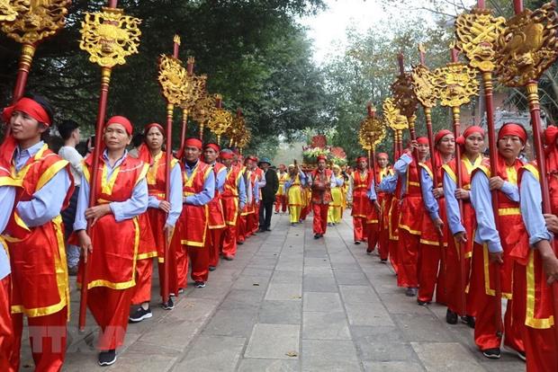 A palanquin procession at the Bai Dinh Pagoda Festival. The Bai Dinh Pagoda is a big complex of Buddhist temples in Trang An Landscape Complex - a world cultural and natural heritage site recognised by UNESCO (Photo: VNA)
