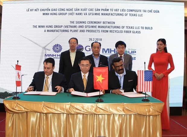 Minh Hưng Group of Việt Nam sign an MoU with the GFSI-MHE Manufacturing of Texas LLC to build and operate a facility to manufacture plywood from recycled composite (fibre glass). (Photo: VNS)