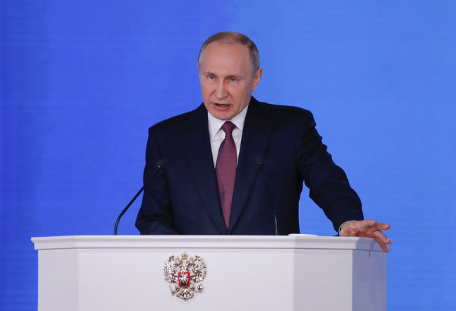 Tổng thống Vladimir Putin cam kết thúc đẩy mức sống của người dân; cải thiện hệ thống y tế, giáo dục và xây dựng cơ sở hạ tầng hiện đại. Ảnh: Reuters