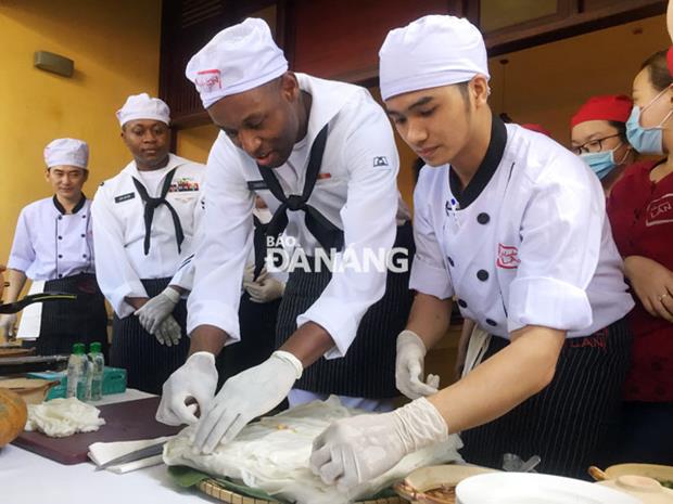 Some of the sailors learning how to prepare noodles for ‘mi Quang’ …