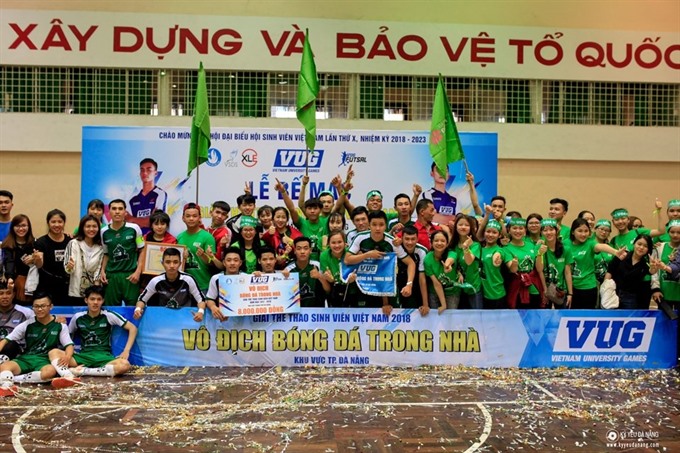 University of East Asia celebrate winning the futsal category of Việt Nam University Games (VUG) in Đà Nẵng on March 19. — Photo kyyeudanang.com Read more at http://vietnamnews.vn/sports/424708/university-of-east-asia-win-vugs-futsal.html#vbboxApd6a6EjBC0.99