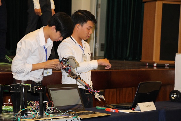 The C-Team members are keen on creating their Robot Arm device at the competition