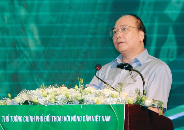 Thủ tướng Nguyễn Xuân Phúc phát biểu tại buổi đối thoại.  				Ảnh: VGP